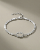 Qiaojin titanium steel couple bracelet vacuum gold plated Valentine's Day snake chain necklace knotted collarbone chain European and American cross-border jewelry Montrel Frames